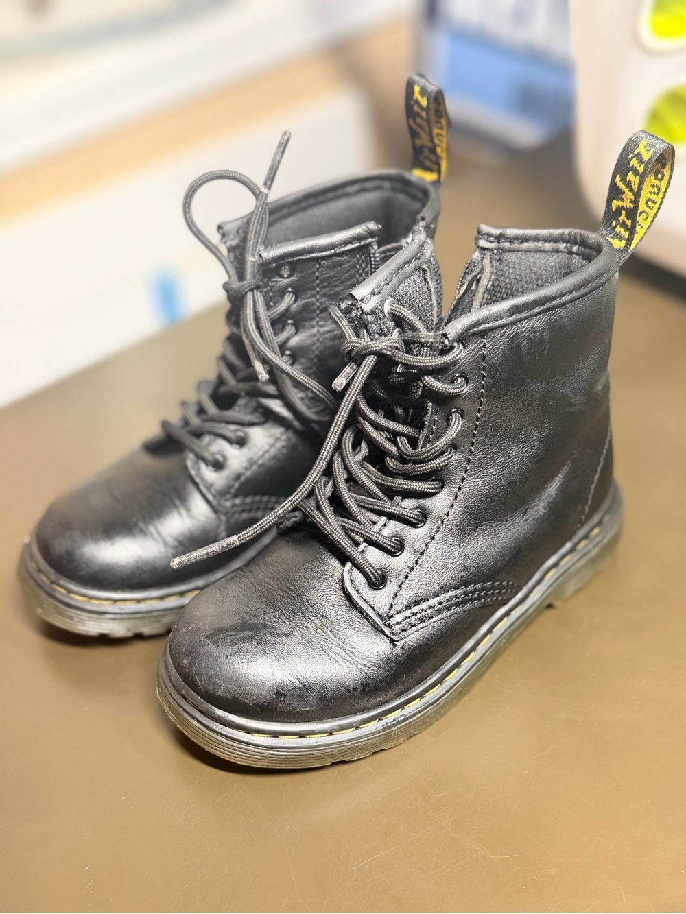 Dr. Martens Kids Black Lace-Up Ankle Boots with Yellow Stitching
